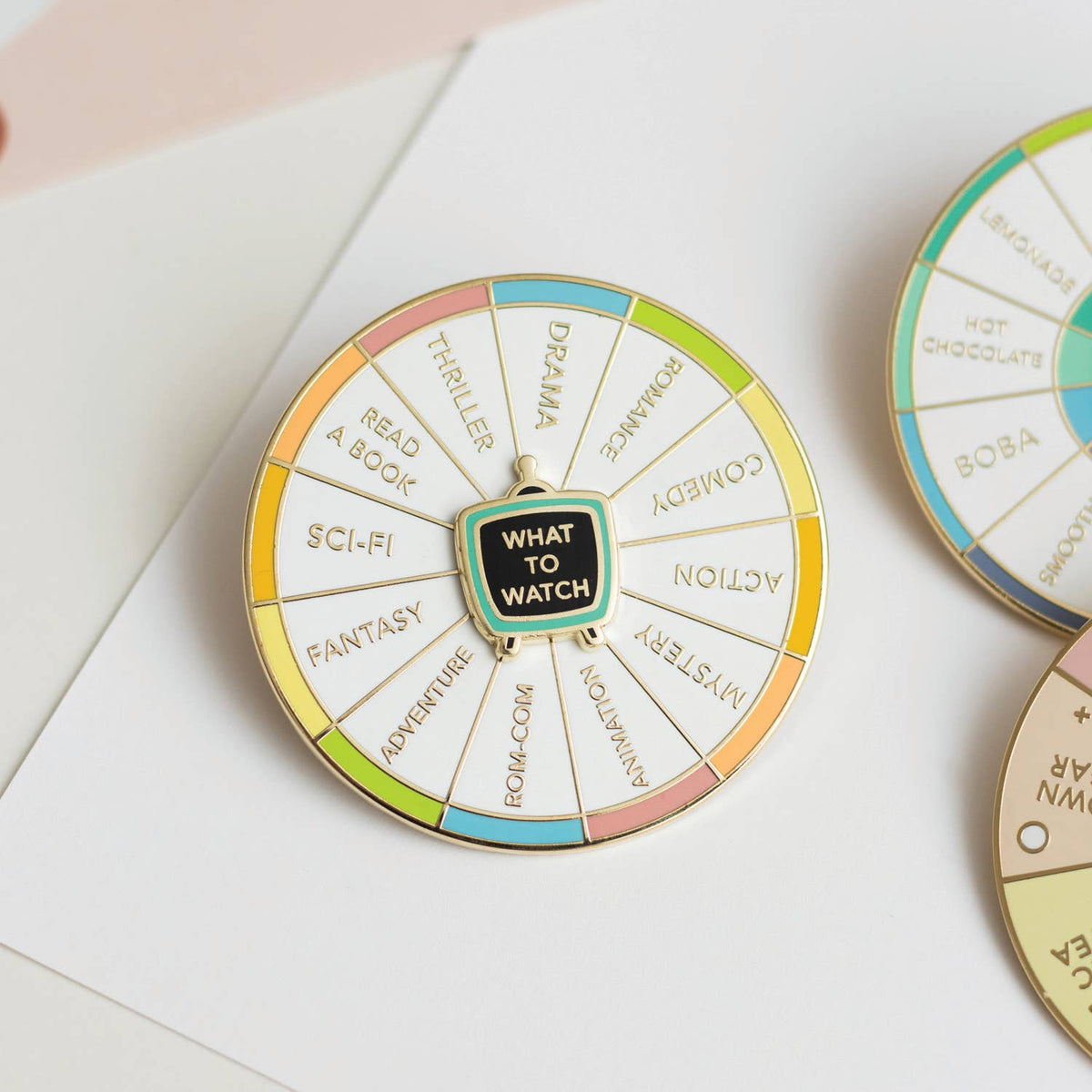 What To Watch Spinning Enamel Pin, Interactive Pin